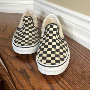 Vans checkered slip ons